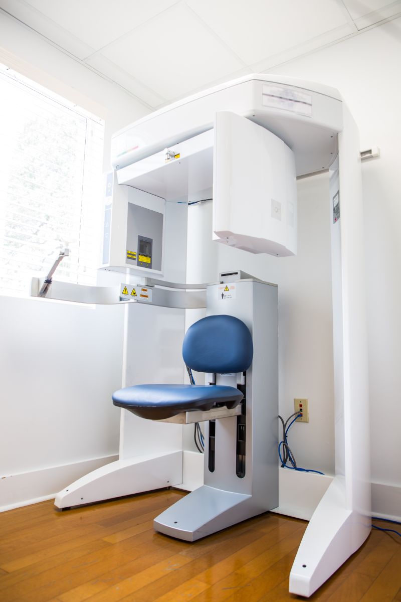 man smiling in dentists chair