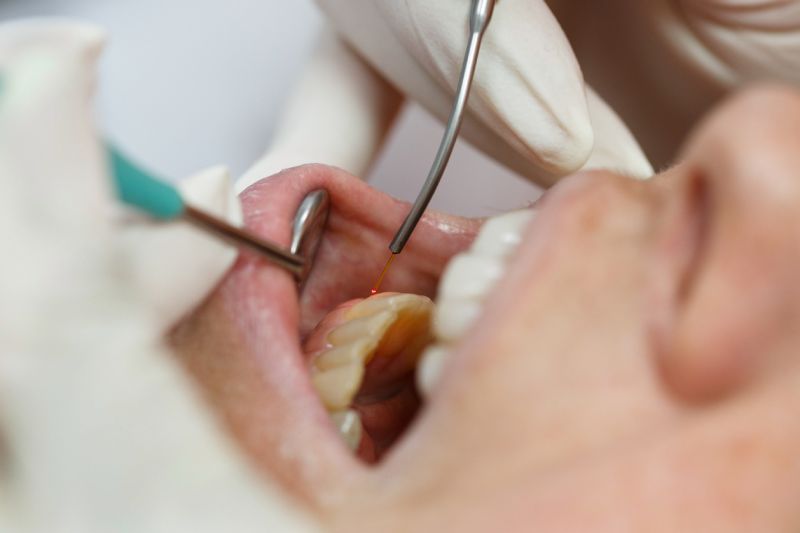 man smiling in dentists chair