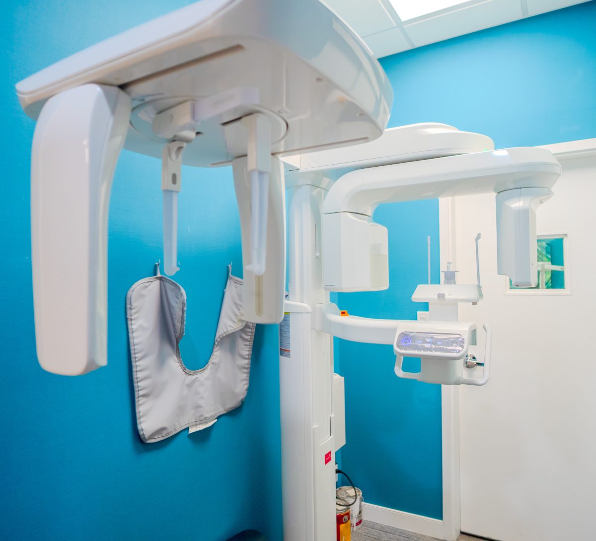 technology man smiling in dentists chair